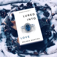 Load image into Gallery viewer, Lured into Love (Blossom in Winter Book 2) - Melanie Martins